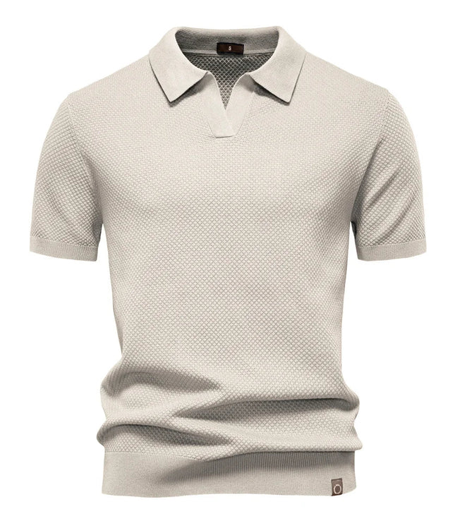 Cream textured short sleeve polo with ribbed collar and cuffs