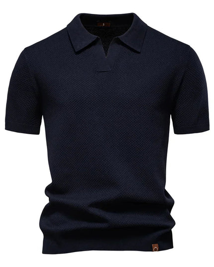 Navy blue textured polo shirt with short sleeves and collar