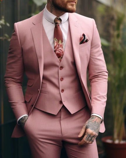Front view of pink three-piece cocktail suit with floral patterned vest
