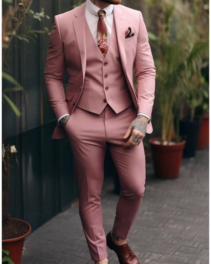 Full-length pink formal three-piece suit with notch lapels and burgundy tie