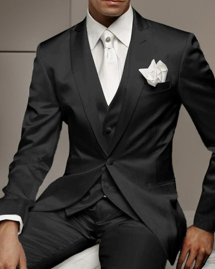 Black single breasted formal suit with white shirt and white pocket square