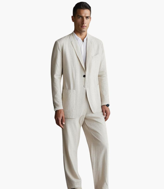 Man wearing cream linen notch lapel suit with straight pants and white shirt