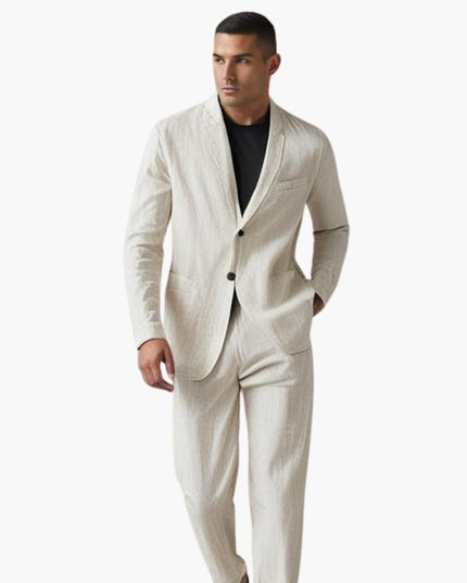 Man in cream linen suit with notch lapel jacket and relaxed straight pants