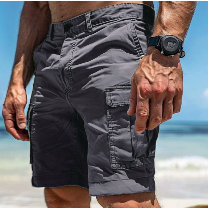 Navy cargo shorts with multiple pockets and belt loops on man at beach