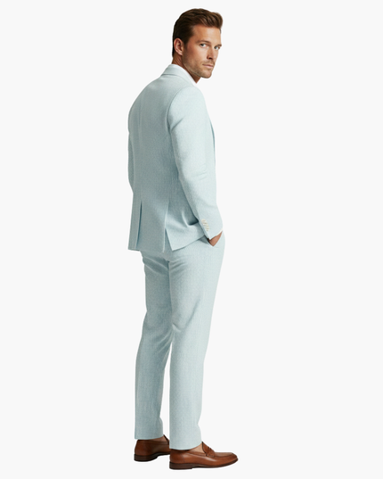 Back view light blue pinstriped summer suit with hand in pocket
