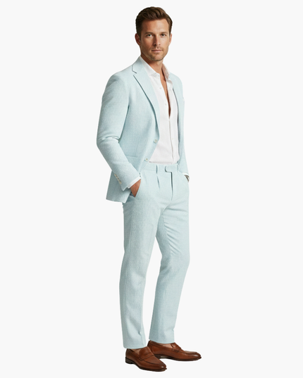 Three-quarter view light blue vertical stripe linen suit jacket