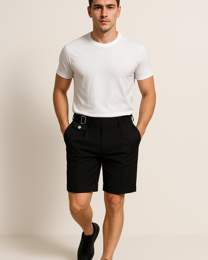 Black tailored pleated shorts with buckle adjuster belt worn with white t-shirt
