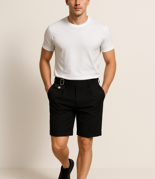 Black tailored pleated shorts with buckle adjuster belt worn with white t-shirt
