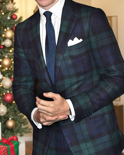 Men's navy and green tartan plaid two button blazer styled with white shirt and tie