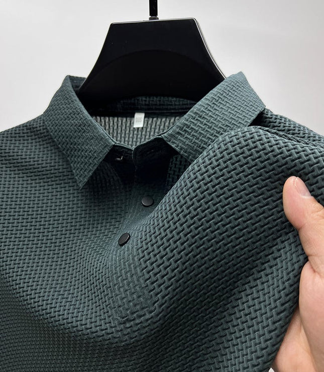 Close-up of teal polo shirt fabric texture and button placket detail