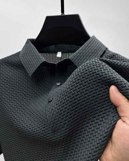Close-up of charcoal polo shirt fabric texture and buttons