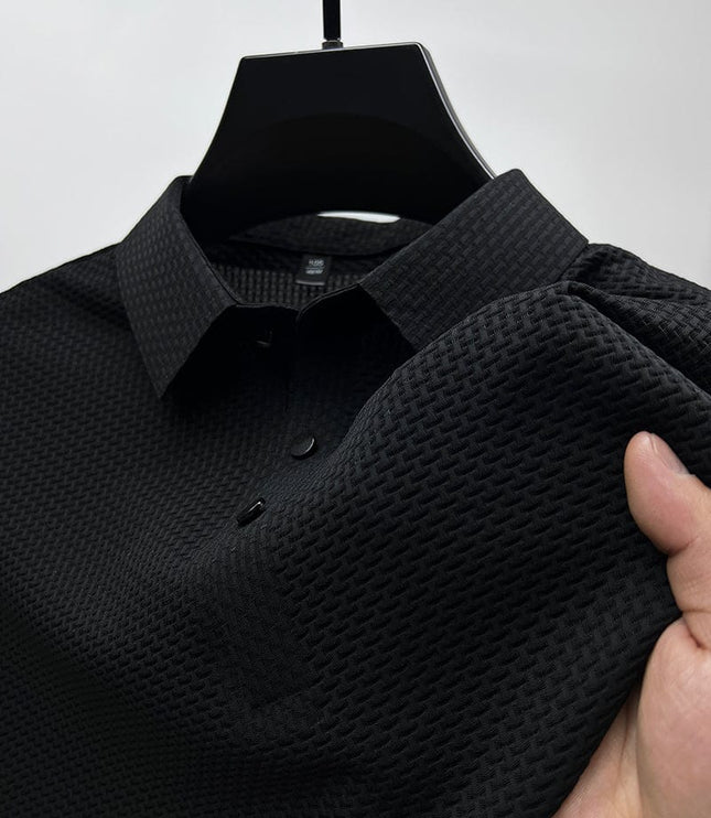 Close-up of black polo shirt textured fabric and collar