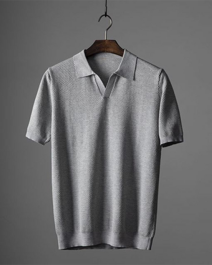 Light gray textured polo shirt with short sleeves and knit detail
