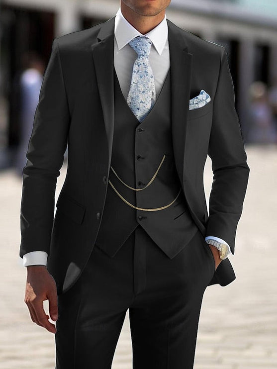 Black formal three piece suit with notch lapel jacket, waistcoat and decorative chain accent