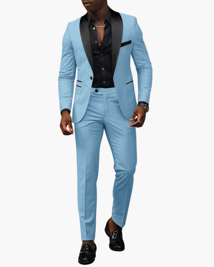 Light blue formal notch lapel suit with black vest and pocket square