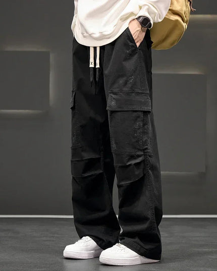Black wide leg cargo pants with utility pockets and relaxed fit