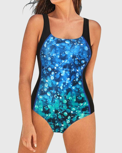 Women's one-piece swimsuit with blue bubble bokeh print and black control panels