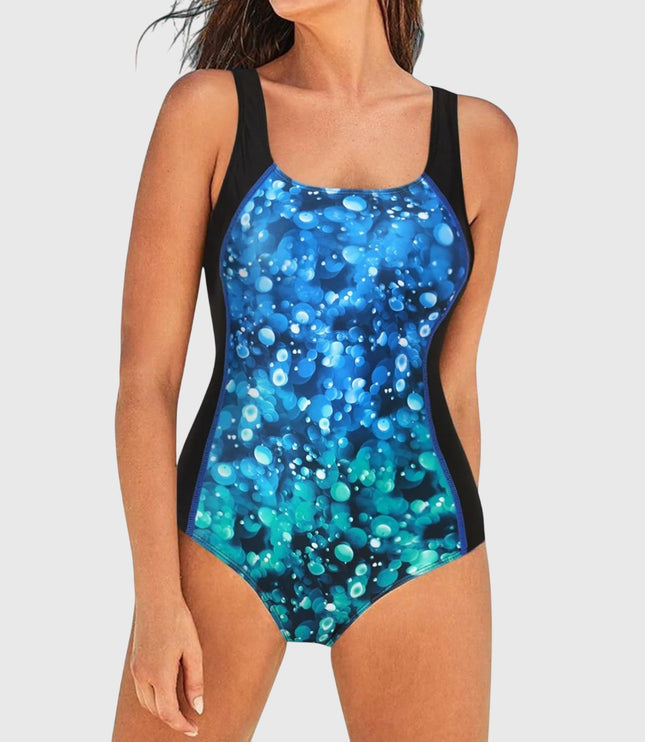 Women's one-piece swimsuit with blue bubble bokeh print and black control panels