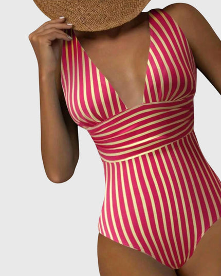 Magenta and yellow striped v-neck one-piece swimsuit with wrapped bodice