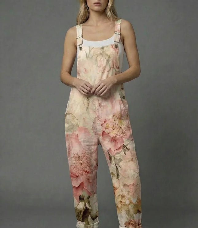 Green textured wide leg romper with raised floral details and a relaxed sleeveless fit