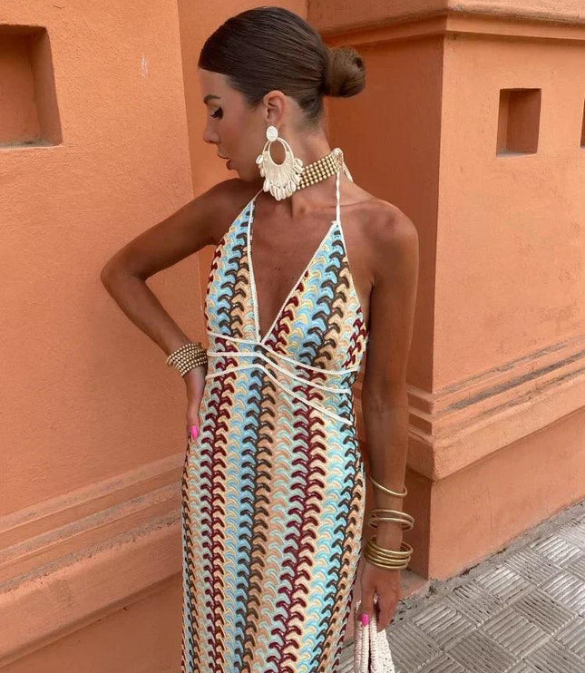 Women's deep V-neck maxi sundress with blue, brown, and cream wave pattern, halter neck tie
