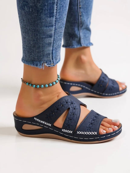 Navy embroidered slide sandals with multi-strap design and perforated details