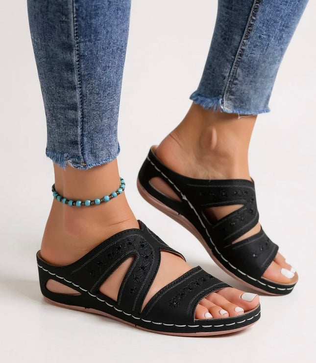 Black embroidered strappy sandals with cutout design and contrast stitching