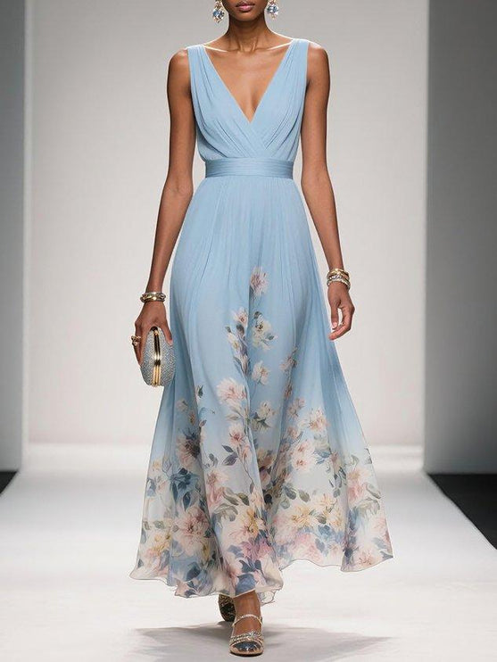 Full view of the light blue floral print v-neck sleeveless maxi dress, showcasing its elegant drape and soft floral design.