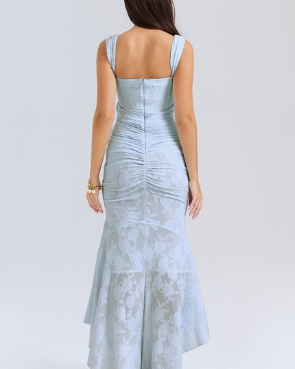 Back view of the light blue floral corset midi dress, highlighting the ruched detailing on the skirt and the square back neckline.