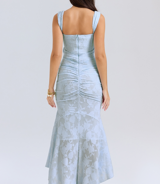 Back view of the light blue floral corset midi dress, highlighting the ruched detailing on the skirt and the square back neckline.