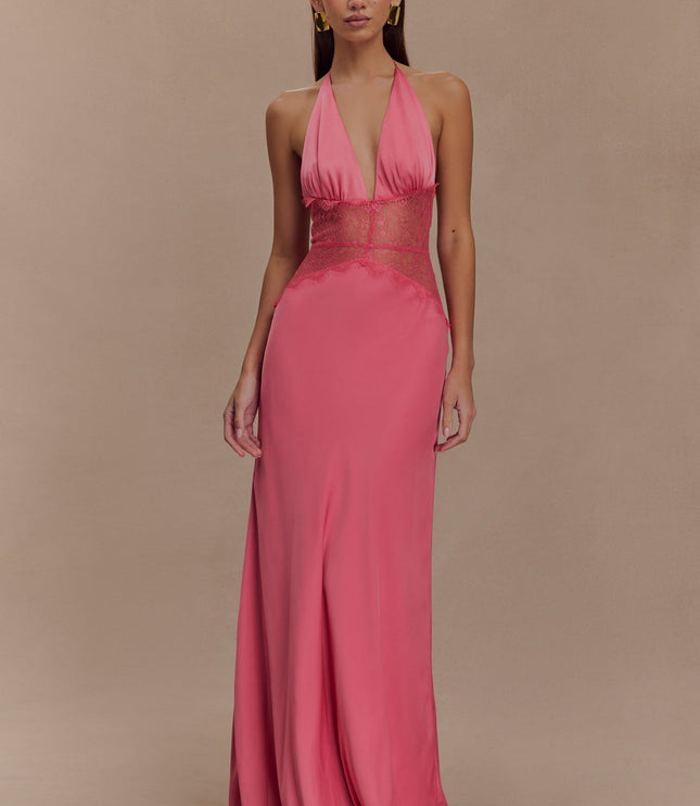 Front view of a women's pink halter neck maxi dress featuring a plunging neckline and sheer lace details.