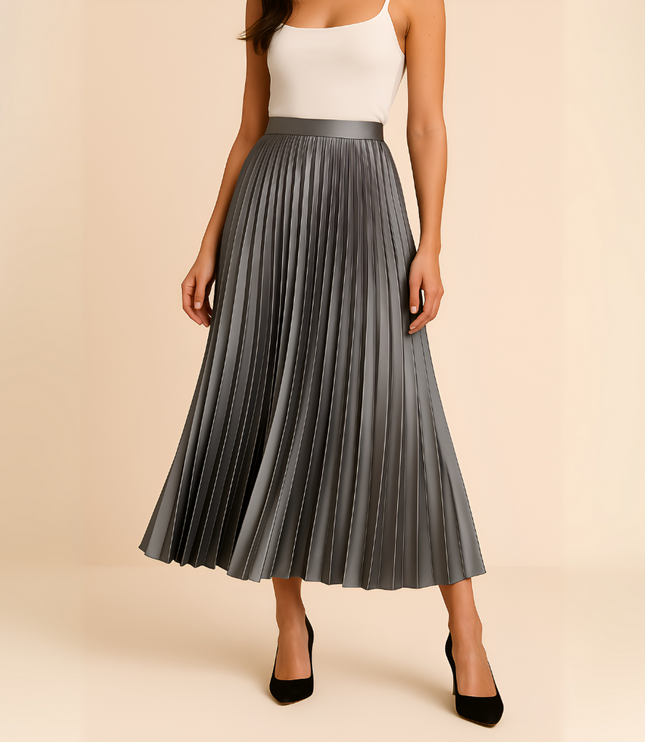 Elegant grey high waisted pleated satin midi skirt, shown with a white top and black heels.