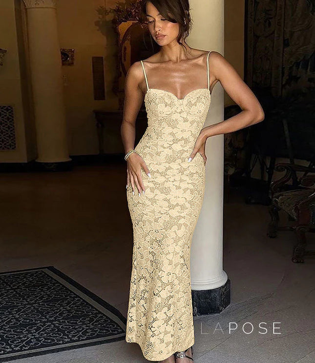 Front view of a beige lace backless spaghetti strap midi dress, highlighting the fitted waist and flowing skirt.