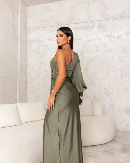 Back view of an olive green one shoulder maxi dress, showing the elegant drape and long sleeve of the women's dress.