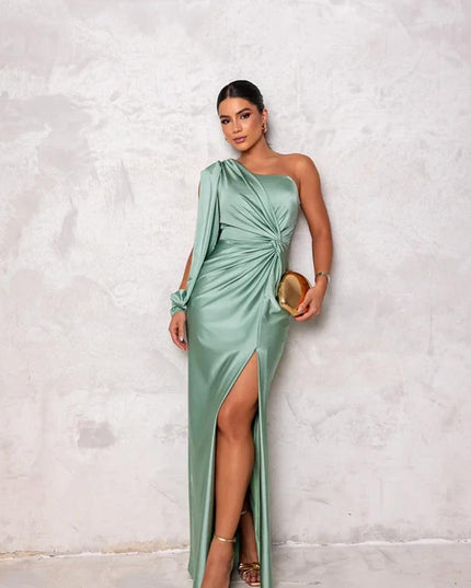 Elegant light green one-shoulder ruched maxi dress with a flowing skirt and side slit, for events