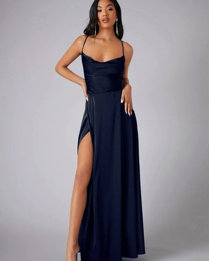 Navy blue satin cowl neck maxi dress with spaghetti straps and a high slit, front view.