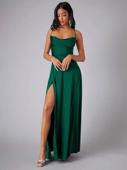 Emerald green satin cowl neck maxi dress with spaghetti straps and a high slit, front view.