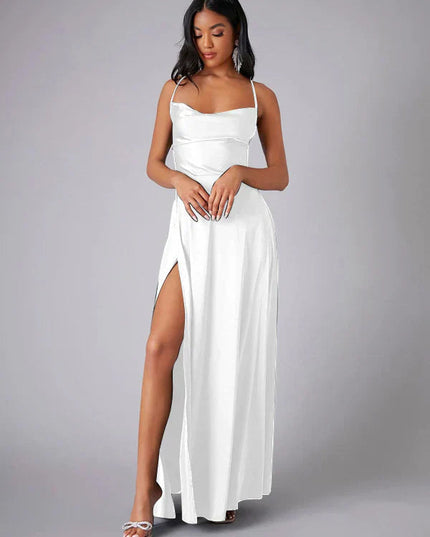 White satin cowl neck maxi dress with spaghetti straps and a high slit, front view.