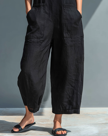 Black linen jumpsuit cropped leg detail with patch pockets