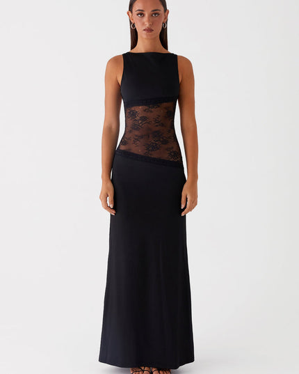 Sleeveless black maxi dress with intricate lace cut-out details on the torso, featuring a sleek, form-fitting silhouette.