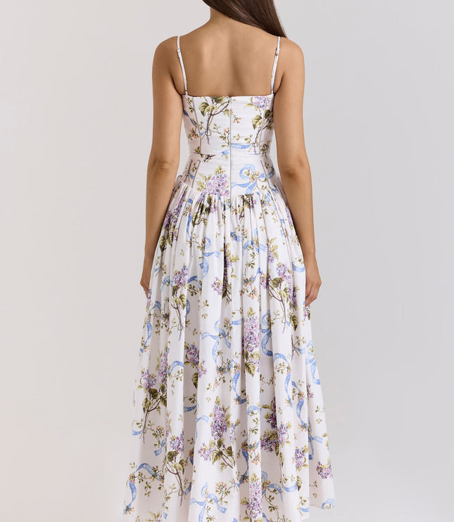 Back view of the white floral corset midi dress featuring purple flowers and blue ribbons, showcasing the zip closure.