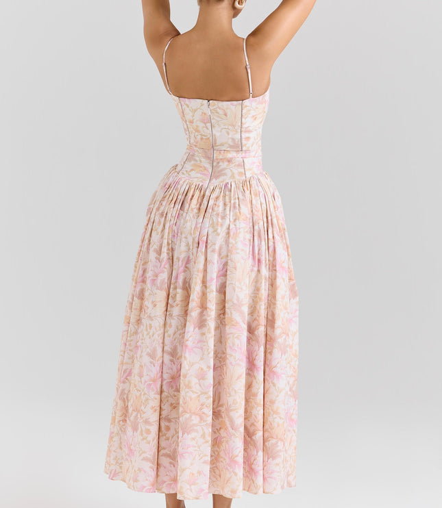 Back view of the women's summer floral corset midi dress, showcasing the pleated skirt and corset detailing.