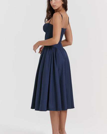 Back view of navy corset midi dress with thin straps