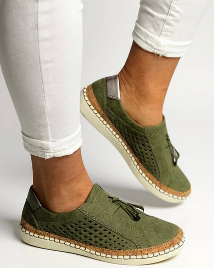Olive green suede tassel loafer with breathable perforations and cream sole