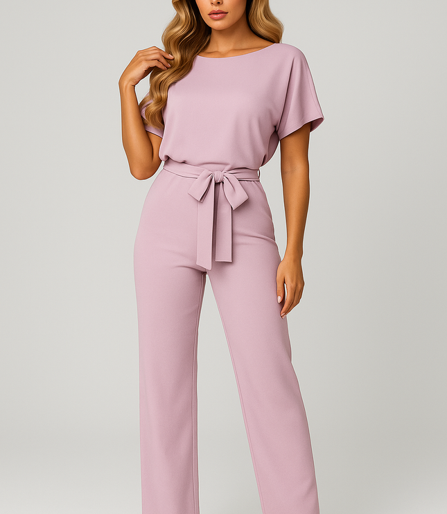 Pink wide leg jumpsuit with short sleeves, round neckline, and self-tie belt at the waist