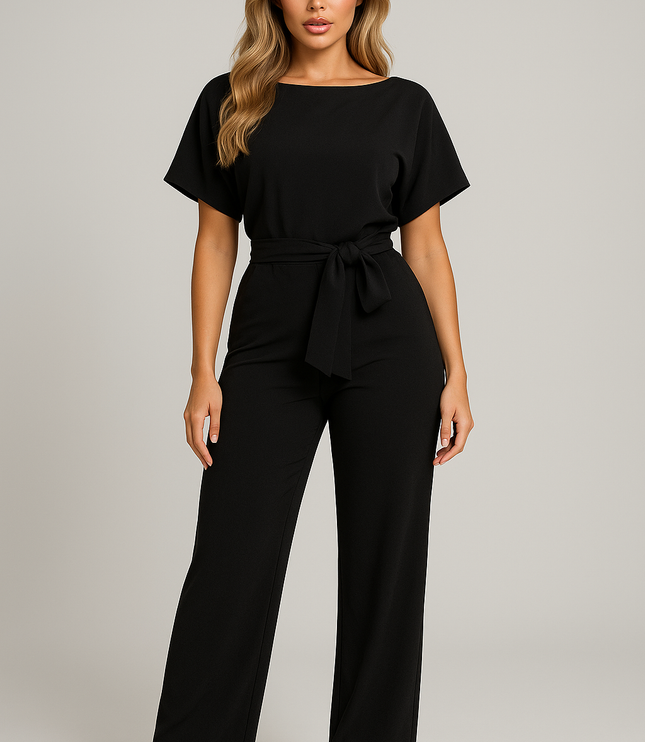 Black wide leg jumpsuit with short sleeves, belted waist, and relaxed straight silhouette