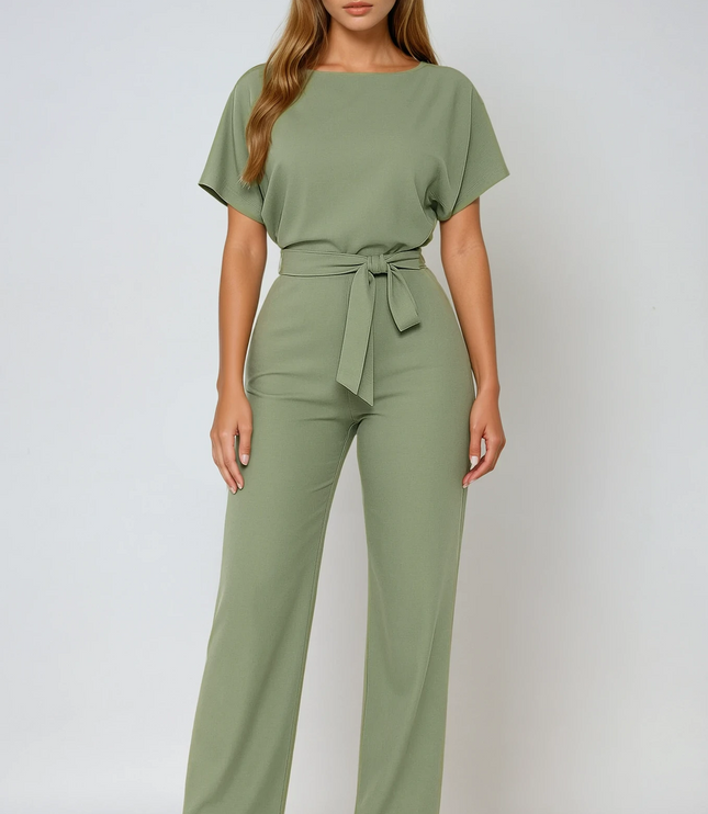 Sage green wide leg jumpsuit with short sleeves, boat neckline, and tied waist belt