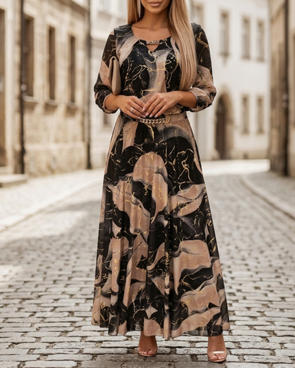Women's abstract print V neck maxi dress in black and beige, front view with long sleeves and belted waist