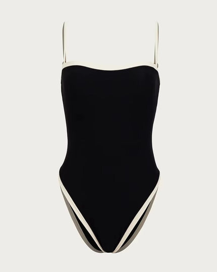 Black one piece swimsuit with contrasting white side panels and straps