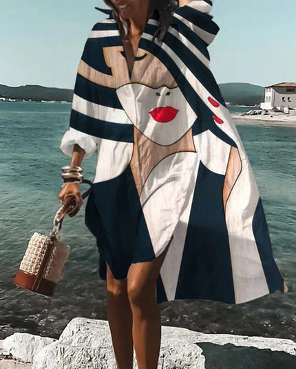Navy and white beach mini shirt dress with bold face graphic print and oversized shirt style